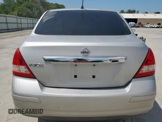 2009 Nissan Versa S with VIN 3N1BC11E39L376873, listed as a Copart auction lot 60299465 with 134,769 mi miles and Salvage title. Bid and sale history available at DreamBid. Image 6.