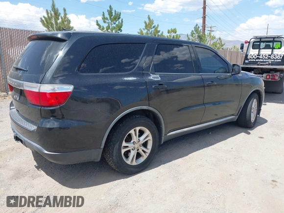 2012 Dodge Durango SXT with VIN 1C4RDJAG0CC206726, listed as a IAAI auction lot 42653653 with 243,337 mi miles and . Bid and sale history available at DreamBid. Image 4.
