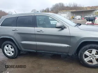2012 Jeep Grand Cherokee Laredo with VIN 1C4RJFAGXCC118823, listed as a IAAI auction lot 41808398 with 153,509 mi miles. Bid and sale history available at carsss.com. Image 13.