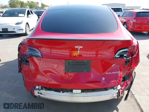 2022 Tesla Model Y Performance z VIN 7SAYGDEF0NF518740, wystawiony jako IAAI lot #41785358 z przebiegiem 50 692 mil mil oraz . Historia ofert i sprzedaży dostępna na DreamBid. Obrazek 17.