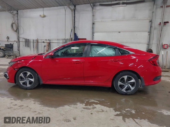 2020 Honda Civic LX with VIN 2HGFC2F6XLH551000, listed as a IAAI auction lot 42279270 with 76,134 mi miles and . Bid and sale history available at DreamBid. Image 14.