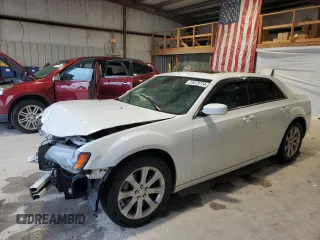 2013 Chrysler 300 with VIN 2C3CCAGGXDH590162, listed as a Copart auction lot 73473774 with 146,486 mi miles and Salvage Title. Bid and sale history available at carsss.com. Image 1.