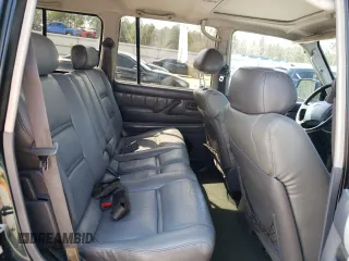 1995 Toyota Land Cruiser z VIN JT3DJ81W9S0112464, wystawiony jako Copart lot #49925395 z przebiegiem 215 698 mil mil oraz Czysty tytuł • Clean title. Historia ofert i sprzedaży dostępna na DreamBid. Obrazek 11.