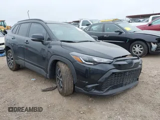 2023 Toyota Corolla Cross Hybrid S with VIN 7MUFBABG6PV010999, listed as a IAAI auction lot 41489541 with 14,707 mi miles and . Bid and sale history available at DreamBid. Image 1.