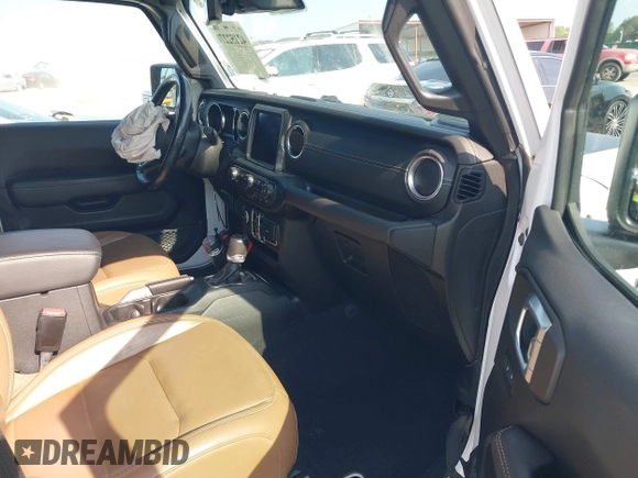 2021 Jeep Wrangler Unlimited Sahara z VIN 1C4JJXP6XMW840844, wystawiony jako IAAI lot #42152271 z przebiegiem 68 209 mil mil oraz . Historia ofert i sprzedaży dostępna na DreamBid. Obrazek 5.