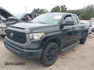 2019 Toyota Tundra SR with VIN 5TFRM5F1XKX143105, listed as a IAAI auction lot 41274567 with 180,602 mi miles and . Bid and sale history available at DreamBid. Image 2.