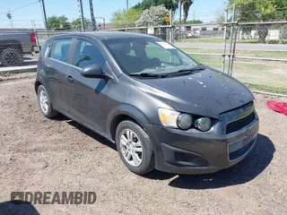 2014 Chevrolet Sonic LT with VIN 1G1JC6SHXE4190514, listed as a IAAI auction lot 41957469 with 50,251 mi miles. Bid and sale history available at carsss.com. Image 1.