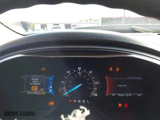 2020 Ford Fusion Hybrid SE with VIN 3FA6P0LU6LR184925, listed as a IAAI auction lot 41328622 with 40,412 mi miles. Bid and sale history available at carsss.com. Image 7.