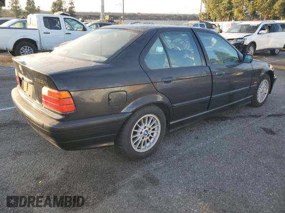 1997 BMW 3 Series 328iA with VIN WBACD4325VAV48712, listed as a Copart auction lot 80376064 with 158,118 mi miles and Salvage Title. Bid and sale history available at carsss.com. Image 3.