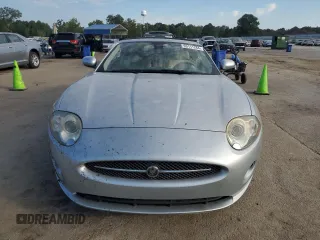 2007 Jaguar XK with VIN SAJDA44B075B01008, listed as a Copart auction lot 69111284 with 0 mi miles and Salvage Title. Bid and sale history available at carsss.com. Image 5.