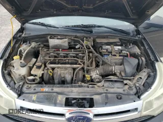 2009 Ford Focus SE z VIN 1FAHP35N29W248755, wystawiony jako Copart lot #55653955 z przebiegiem 213 234 mil mil oraz Szkoda całkowita • Salvage title. Historia ofert i sprzedaży dostępna na DreamBid. Obrazek 11.