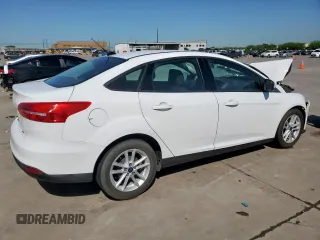 2018 Ford Focus SE z VIN 1FADP3F29JL225126, wystawiony jako Copart lot #52817265 z przebiegiem Nie podano mil oraz Szkoda całkowita • Salvage title. Historia ofert i sprzedaży dostępna na DreamBid. Obrazek 3.