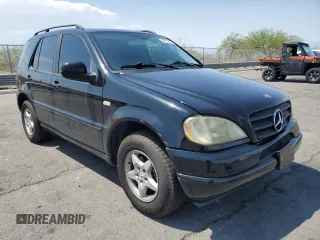 2001 Mercedes-Benz M 320/430/500 with VIN 4JGAB54EX1A241105, listed as a Copart auction lot 59773455 with 242,944 mi miles and Salvage title. Bid and sale history available at DreamBid. Image 4.