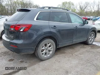 2015 Mazda CX-9 Touring with VIN JM3TB3CA3F0460864, listed as a IAAI auction lot 41944957 with 242,100 mi miles. Bid and sale history available at carsss.com. Image 4.