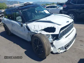 2012 MINI Countryman S with VIN WMWZC3C54CWL86735, listed as a IAAI auction lot 42448799 with 113,668 mi miles and . Bid and sale history available at DreamBid. Image 1.