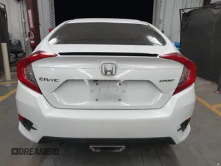 2019 Honda Civic Sport with VIN 19XFC2F86KE022749, listed as a IAAI auction lot 42127993 with 116,279 mi miles and . Bid and sale history available at DreamBid. Image 16.