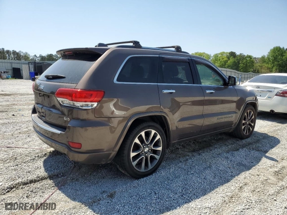 2017 Jeep Grand Cherokee Overland with VIN 1C4RJECG1HC868559, listed as a Copart auction lot 52569595 with 168,226 mi miles and Clean Title. Bid and sale history available at carsss.com. Image 3.