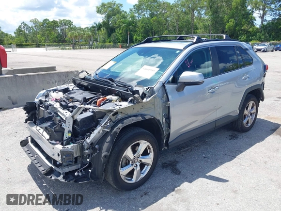 2021 Toyota RAV4 Hybrid LE with VIN 2T3B6RFV2MW018967, listed as a IAAI auction lot 42601989 with 71,046 mi miles and . Bid and sale history available at DreamBid. Image 18.