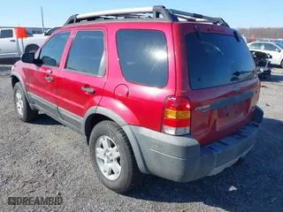 2005 Ford Escape XLT with VIN 1FMCU93115KB29320, listed as a IAAI auction lot 41768208 with 162,047 mi miles. Bid and sale history available at carsss.com. Image 3.