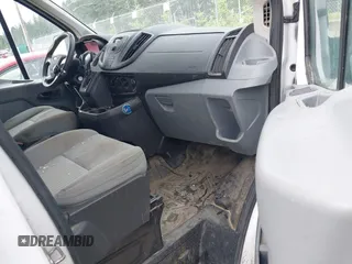 2015 Ford Transit Cargo with VIN 1FTNR1ZM6FKA34609, listed as a IAAI auction lot 42635875 with 214,750 mi miles and . Bid and sale history available at DreamBid. Image 5.