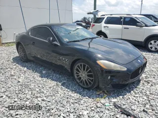 2011 Maserati GranTurismo S with VIN ZAM45KLA9B0059436, listed as a Copart auction lot 55851475 with Not provided miles and Clean title. Bid and sale history available at DreamBid. Image 4.