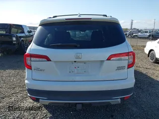 2021 Honda Pilot Touring 8-Passenger with VIN 5FNYF6H92MB031782, listed as a IAAI auction lot 42087322 with 70,062 mi miles and . Bid and sale history available at DreamBid. Image 16.