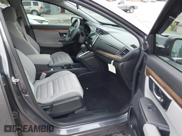 2019 Honda CR-V EX with VIN 7FARW1H57KE037678, listed as a IAAI auction lot 41790923 with 61,754 mi miles and . Bid and sale history available at DreamBid. Image 5.