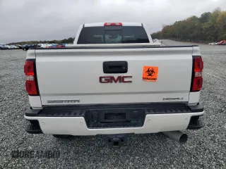 2019 GMC Sierra 2500HD Denali z VIN 1GT12SEY8KF150379, wystawiony jako Copart lot #80525704 z przebiegiem Nie podano mil oraz Szkoda całkowita • Salvage title. Historia ofert i sprzedaży dostępna na DreamBid. Obrazek 6.