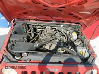 2009 Jeep Wrangler X with VIN 1J4FA24189L776078, listed as a Copart auction lot 57902705 with 104,994 mi miles and Salvage title. Bid and sale history available at DreamBid. Image 12.