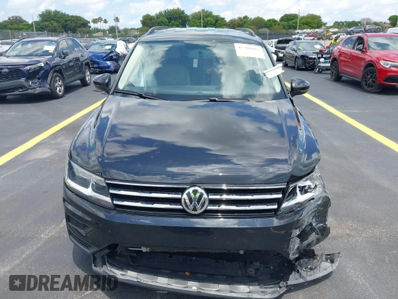 2021 Volkswagen Tiguan S z VIN 3VV1B7AX7MM116609, wystawiony jako IAAI lot #42206016 z przebiegiem 47 049 mil mil oraz . Historia ofert i sprzedaży dostępna na DreamBid. Obrazek 12.