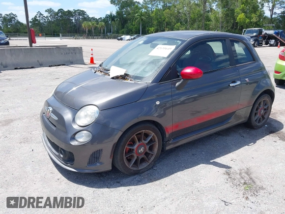 2015 FIAT 500 Abarth with VIN 3C3CFFFH2FT507879, listed as a IAAI auction lot 42135649 with 163,663 mi miles. Bid and sale history available at carsss.com. Image 2.