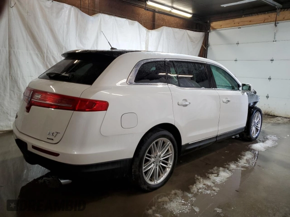 2016 Lincoln MKT EcoBoost z VIN 2LMHJ5AT8GBL01646, wystawiony jako Copart lot #85357264 z przebiegiem 77 066 mil mil oraz Szkoda całkowita • Salvage title. Historia ofert i sprzedaży dostępna na DreamBid. Obrazek 3.