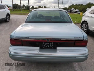 1996 Mercury Grand Marquis GS with VIN 2MELM74W5TX653873, listed as a Copart auction lot 74659254 with 86,589 mi miles and Salvage Title. Bid and sale history available at DreamBid. Image 6.