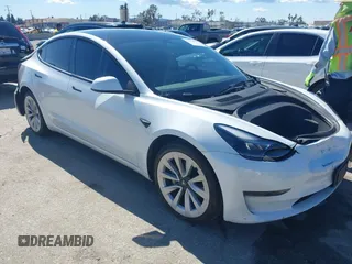 2023 Tesla Model 3 z VIN 5YJ3E1EA3PF451392, wystawiony jako IAAI lot #41668299 z przebiegiem 77 915 mil mil oraz . Historia ofert i sprzedaży dostępna na DreamBid. Obrazek 1.