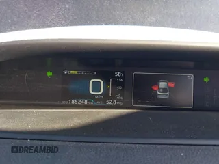 2021 Toyota Prius L Eco z VIN JTDKAMFU1M3134107, wystawiony jako IAAI lot #41763080 z przebiegiem 185 248 mil mil oraz . Historia ofert i sprzedaży dostępna na DreamBid. Obrazek 7.