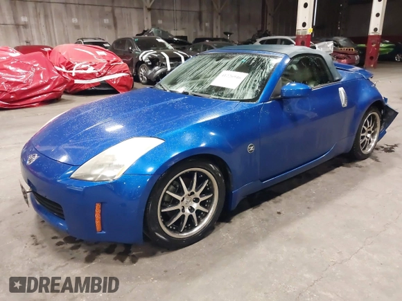2005 Nissan 350Z Touring z VIN JN1AZ36A95M753704, wystawiony jako IAAI lot #41226946 z przebiegiem 94 351 mil mil oraz . Historia ofert i sprzedaży dostępna na DreamBid. Obrazek 2.