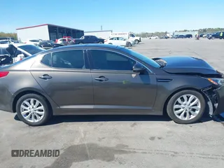 2014 Kia Optima EX z VIN 5XXGN4A71EG346924, wystawiony jako IAAI lot #41863871 z przebiegiem 230 605 mil mil oraz . Historia ofert i sprzedaży dostępna na DreamBid. Obrazek 12.