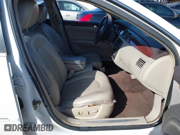 2009 Buick Lucerne CXL with VIN 1G4HD57M19U109257, listed as a IAAI auction lot 42064449 with 153,665 mi miles. Bid and sale history available at carsss.com. Image 5.
