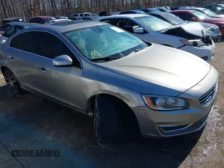 2016 Volvo S60 T5 Premier z VIN LYV612TK2GB099241, wystawiony jako IAAI lot #41808950 z przebiegiem 153 693 mil mil oraz . Historia ofert i sprzedaży dostępna na DreamBid. Obrazek 1.