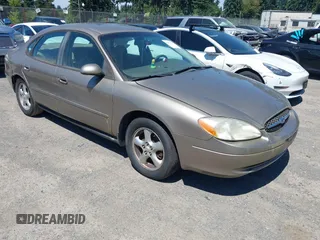 2002 Ford Taurus SES Standard z VIN 1FAFP55U62G184746, wystawiony jako IAAI lot #42673500 z przebiegiem 179 245 mil mil oraz . Historia ofert i sprzedaży dostępna na DreamBid. Obrazek 1.