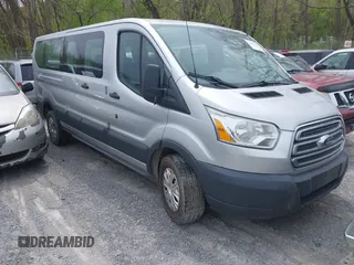 2016 Ford Transit Wagon XL with VIN 1FBZX2ZM8GKA69218, listed as a IAAI auction lot 42027106 with 311,419 mi miles. Bid and sale history available at carsss.com. Image 1.