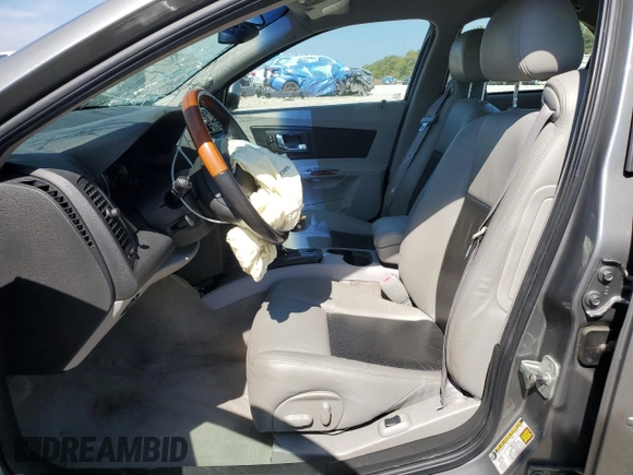 2005 Cadillac CTS z VIN 1G6DP567150209692, wystawiony jako Copart lot #71979594 z przebiegiem 73 155 mil mil oraz Szkoda całkowita • Salvage title. Historia ofert i sprzedaży dostępna na DreamBid. Obrazek 7.