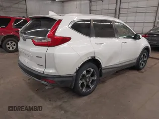 2017 Honda CR-V Touring with VIN 2HKRW2H94HH685350, listed as a IAAI auction lot 41753725 with 75,749 mi miles. Bid and sale history available at carsss.com. Image 4.