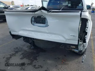 2020 Toyota Tacoma SR5 with VIN 3TMBZ5DN7LM026596, listed as a IAAI auction lot 40705410 with 123,489 mi miles and . Bid and sale history available at DreamBid. Image 6.