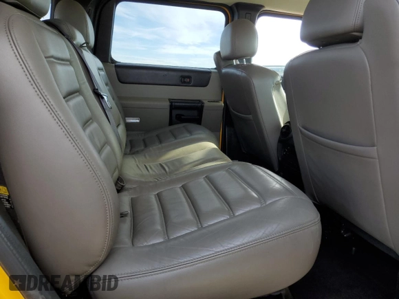 2006 Hummer H2 with VIN 5GRGN23U26H100166, listed as a Copart auction lot 87228964 with 71,727 mi miles and Salvage Title. Bid and sale history available at carsss.com. Image 10.