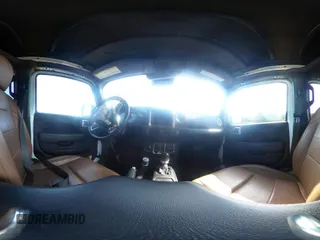 2021 Jeep Wrangler Unlimited Sahara z VIN 1C4JJXP6XMW840844, wystawiony jako IAAI lot #42152271 z przebiegiem 68 209 mil mil oraz . Historia ofert i sprzedaży dostępna na DreamBid. Obrazek 18.