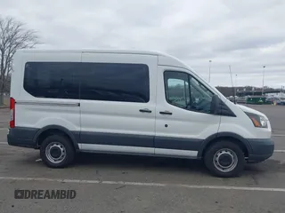 2016 Ford Transit Cargo with VIN 1FTYR1CM5GKA27058, listed as a IAAI auction lot 41753527 with 112,824 mi miles and . Bid and sale history available at DreamBid. Image 13.