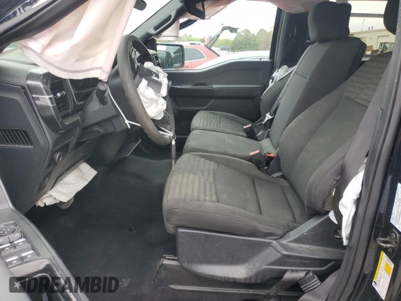 2023 Ford F-150 XL with VIN 1FTEW1EP5PKF67674, listed as a Copart auction lot 50348795 with 23,176 mi miles and Salvage title. Bid and sale history available at DreamBid. Image 7.