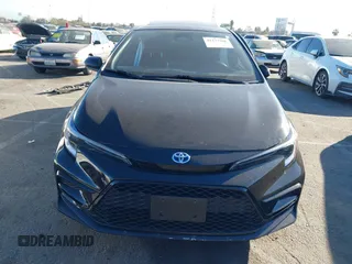2023 Toyota Corolla Hybrid LE with VIN JTDBCMFE6P3001785, listed as a IAAI auction lot 41337266 with 25,829 mi miles. Bid and sale history available at carsss.com. Image 12.