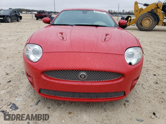 2007 Jaguar XK with VIN SAJWA43C379B19952, listed as a Copart auction lot 85141054 with 49,599 mi miles and Salvage Title. Bid and sale history available at carsss.com. Image 5.